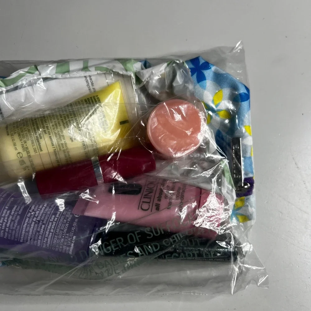 Clinique Skincare and Makeup Travel Set with Floral Cosmetic Bag‎ New